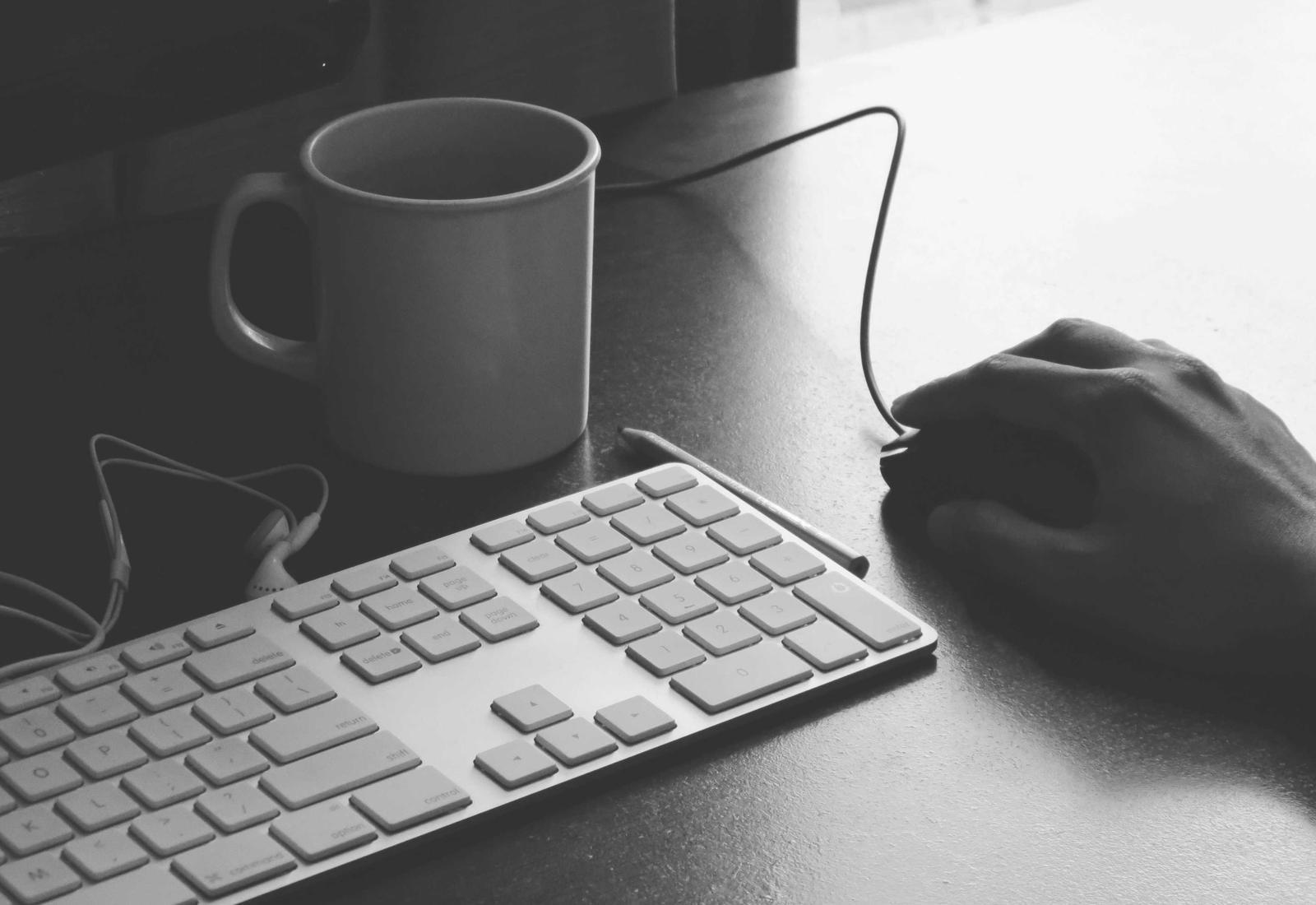 A keyboard and mouse at a security analyst's desk